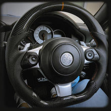 Load image into Gallery viewer, Carbon Fiber Steering Wheel For Toyota GR86 | Subaru BRZ | GM. Modi-Hub
